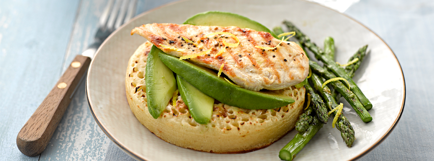 Chicken, avocado and asparagus on a giant crumpet